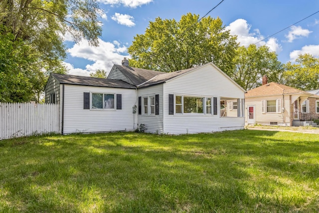 313 Grand Blvd, Loves Park, IL 61111 - back of house with a chimney and a shingled roof