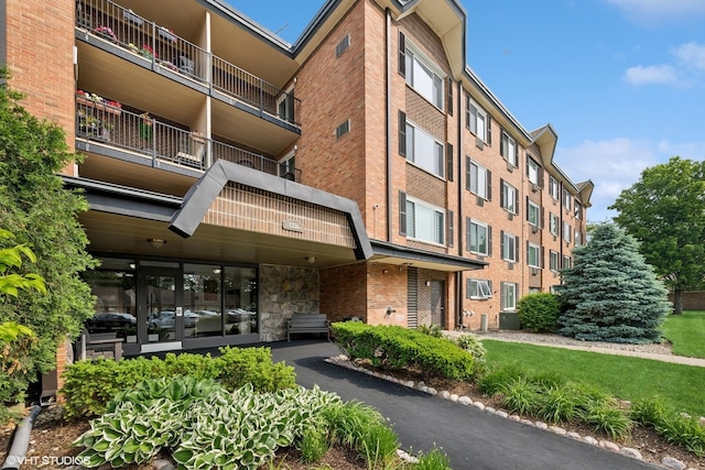 1226 S New Wilke Rd Unit 304, Arlington Heights, IL 60005 - view of apartment building / complex