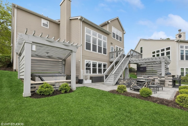 2758 Palm Springs Ln, Aurora, IL 60502 - back of house with a pergola, a covered hot tub, a patio area, and a chimney