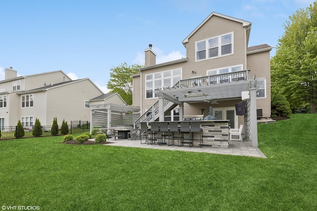 2758 Palm Springs Ln, Aurora, IL 60502 - rear view of house featuring a pergola, a chimney, a patio area, and a wooden deck