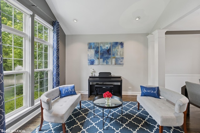 2758 Palm Springs Ln, Aurora, IL 60502 - sitting room featuring baseboards, wood finished floors, ornate columns, and vaulted ceiling