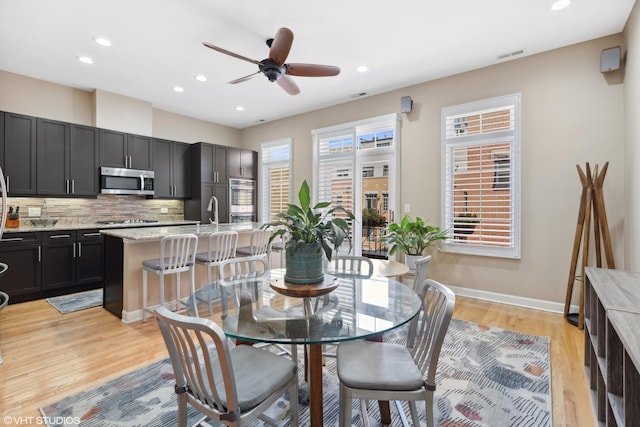 362 W Huron St Unit B, Chicago, IL 60654 - dining area with ceiling fan, recessed lighting, light wood finished floors, and baseboards