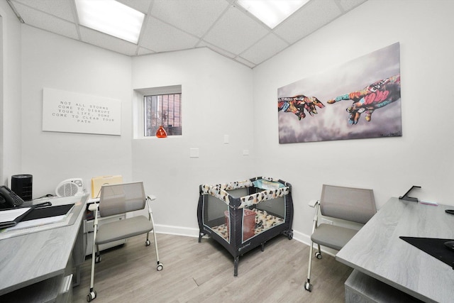 4854 W Addison St, Chicago, IL 60641 - office with a drop ceiling, wood finished floors, and baseboards