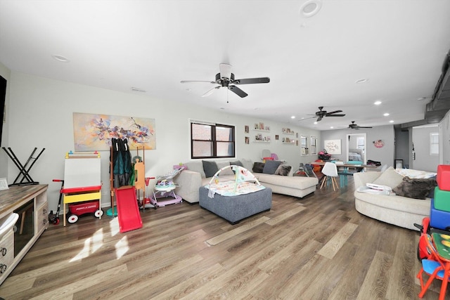 4854 W Addison St, Chicago, IL 60641 - living area with a ceiling fan, wood finished floors, and recessed lighting