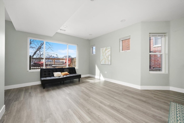 4854 W Addison St, Chicago, IL 60641 - sitting room featuring wood finished floors, baseboards, and recessed lighting