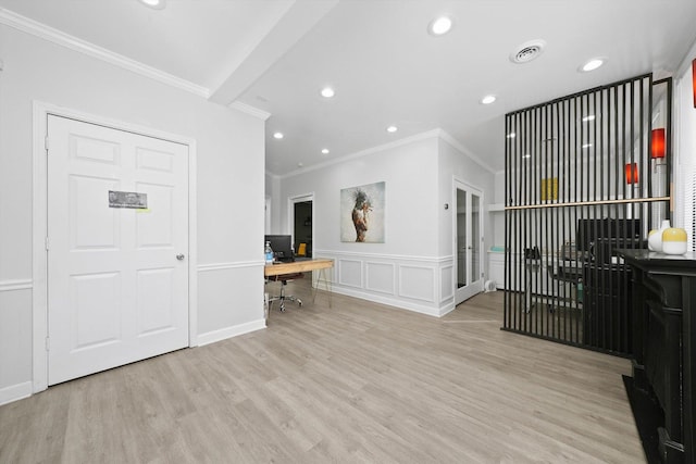 4854 W Addison St, Chicago, IL 60641 - entryway featuring ornamental molding, wood finished floors, recessed lighting, wainscoting, and a decorative wall