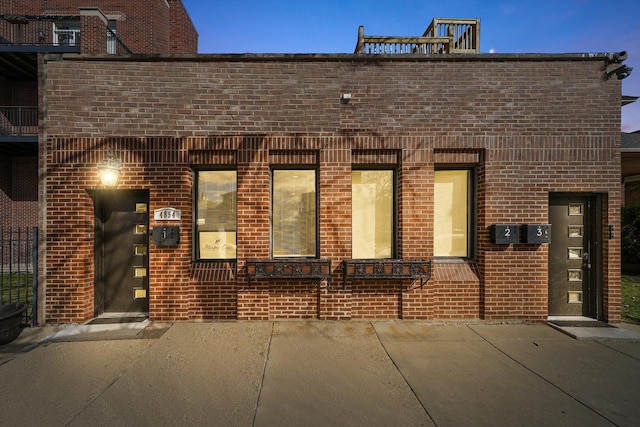 4854 W Addison St, Chicago, IL 60641 - doorway to property featuring brick siding