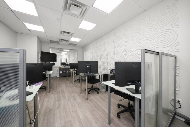4854 W Addison St, Chicago, IL 60641 - office featuring light wood-type flooring, a drop ceiling, and wallpapered walls