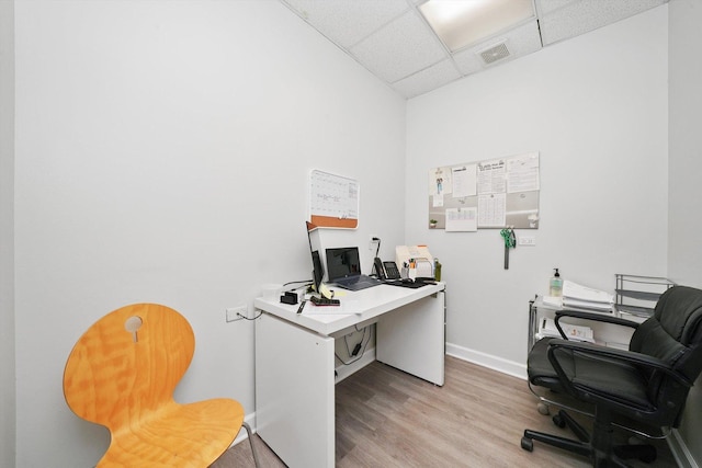 4854 W Addison St, Chicago, IL 60641 - office area with a paneled ceiling, light wood-type flooring, and baseboards