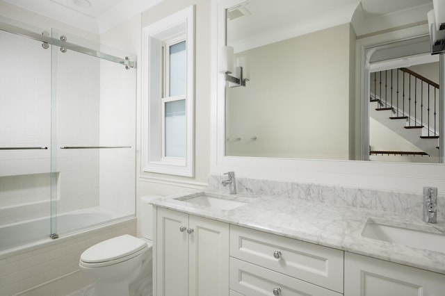 1617 N Bell Ave, Chicago, IL 60647 - bathroom with double vanity and combined bath / shower with glass door