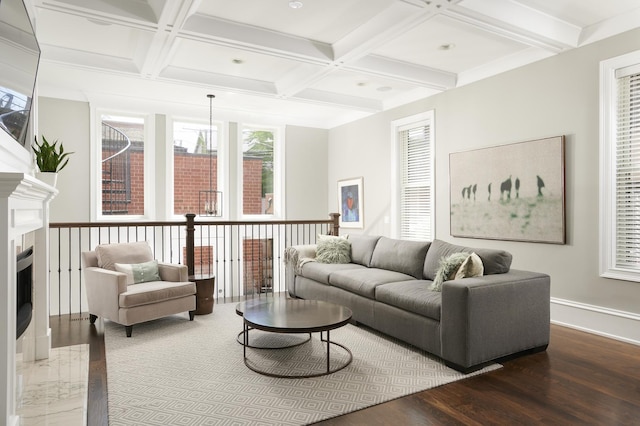 1617 N Bell Ave, Chicago, IL 60647 - living area featuring wood finished floors, coffered ceiling, beamed ceiling, and a fireplace