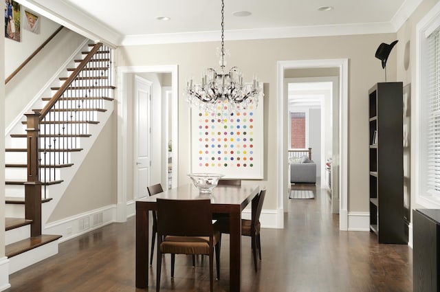 1617 N Bell Ave, Chicago, IL 60647 - dining room featuring stairway, a chandelier, dark wood finished floors, and ornamental molding