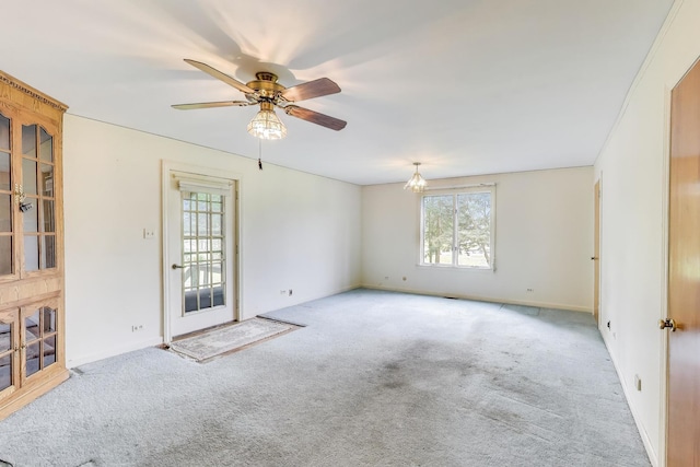 10117 Potter Rd, Des Plaines, IL 60016 - unfurnished room with plenty of natural light and carpet