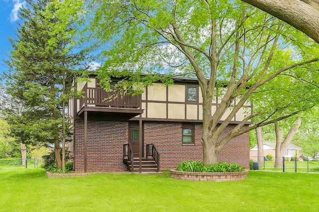 10117 Potter Rd, Des Plaines, IL 60016 - back of house with a balcony and brick siding