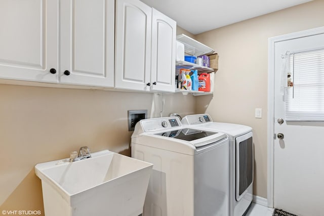 575 County Line Rd, Highland Park, IL 60035 - washroom featuring separate washer and dryer and cabinet space