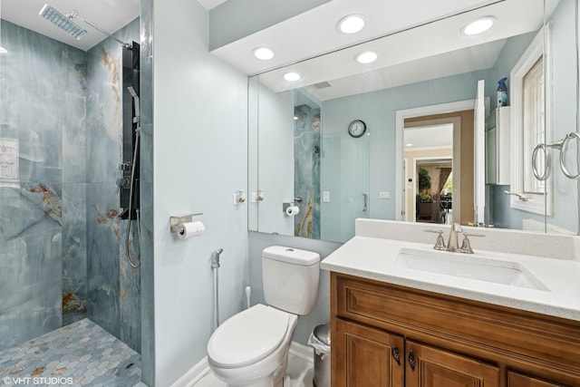 575 County Line Rd, Highland Park, IL 60035 - full bath featuring a marble finish shower, toilet, vanity, recessed lighting, and baseboards
