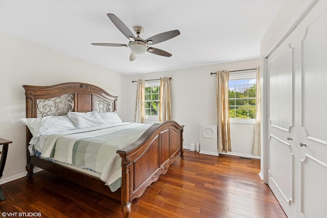 575 County Line Rd, Highland Park, IL 60035 - bedroom featuring dark wood-style flooring, baseboards, and a ceiling fan