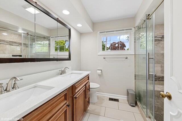 575 County Line Rd, Highland Park, IL 60035 - full bath featuring toilet, a stall shower, double vanity, baseboards, and tile patterned floors
