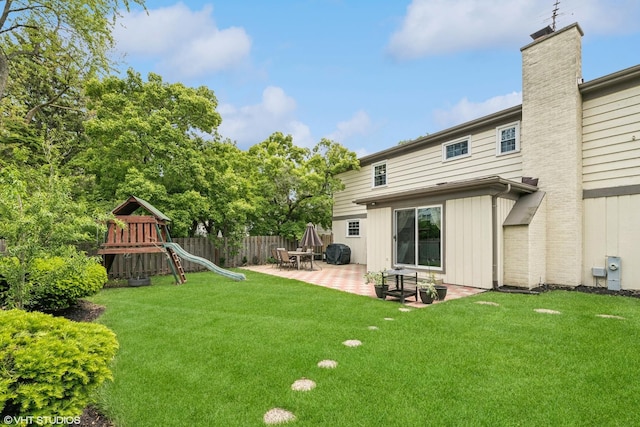 575 County Line Rd, Highland Park, IL 60035 - view of yard with a patio area and a playground
