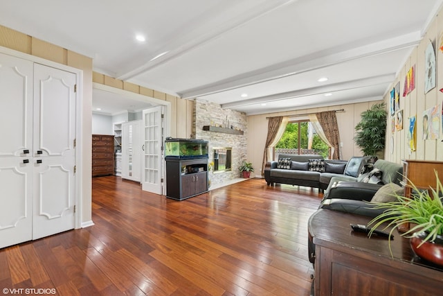 575 County Line Rd, Highland Park, IL 60035 - living area with beam ceiling, a stone fireplace, and wood-type flooring