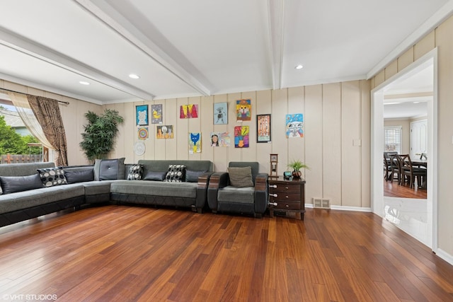 575 County Line Rd, Highland Park, IL 60035 - living room featuring wood finished floors, beam ceiling, and a decorative wall