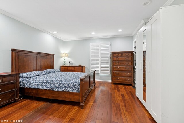 575 County Line Rd, Highland Park, IL 60035 - bedroom with dark wood-style floors, ornamental molding, recessed lighting, and baseboards