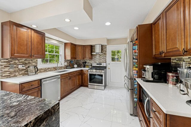 575 County Line Rd, Highland Park, IL 60035 - kitchen with stainless steel appliances, wall chimney range hood, backsplash, light marble finish flooring, and brown cabinets