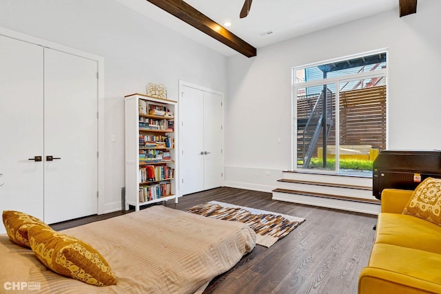 1920 S Shelby Ct, Chicago, IL 60608 - bedroom featuring two closets, beamed ceiling, wood finished floors, baseboards, and a ceiling fan