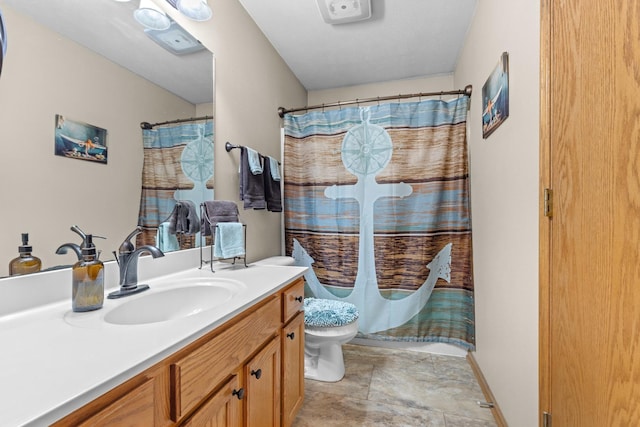 110 SW Benedict Dr, Poplar Grove, IL 61065 - bathroom with toilet, vanity, a shower with curtain, and stone finish flooring