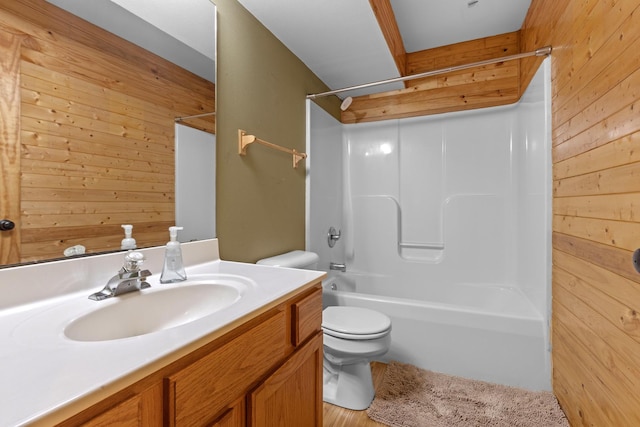 110 SW Benedict Dr, Poplar Grove, IL 61065 - bathroom with wood walls, toilet, shower / bath combination, and vanity