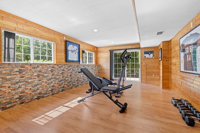 110 SW Benedict Dr, Poplar Grove, IL 61065 - exercise area with wood walls, plenty of natural light, wood finished floors, and recessed lighting