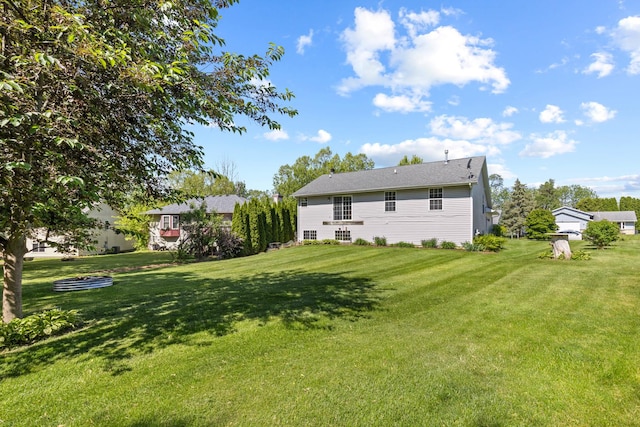 110 SW Benedict Dr, Poplar Grove, IL 61065 - back of house with a yard