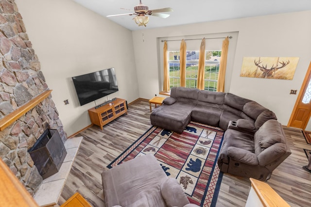 110 SW Benedict Dr, Poplar Grove, IL 61065 - living area with ceiling fan, wood finished floors, a fireplace, and baseboards