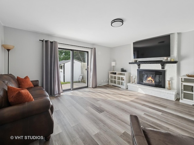 829 Brookside Dr, Bartlett, IL 60103 - living room featuring a fireplace and wood finished floors