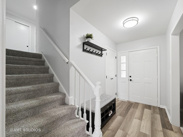 829 Brookside Dr, Bartlett, IL 60103 - foyer with stairs and wood finished floors