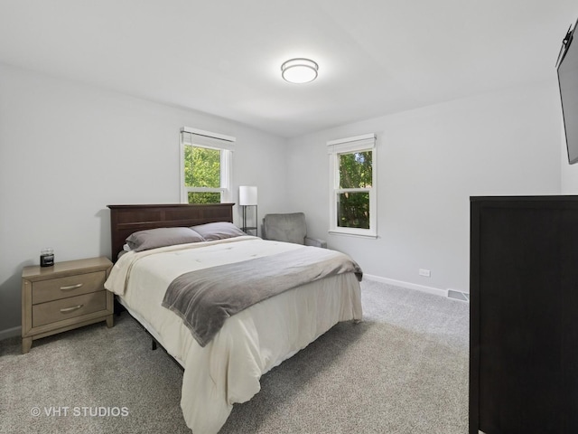 829 Brookside Dr, Bartlett, IL 60103 - bedroom featuring baseboards and light carpet