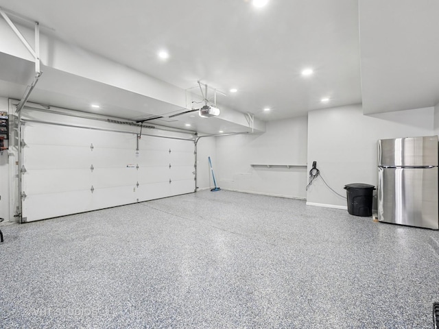 829 Brookside Dr, Bartlett, IL 60103 - garage featuring freestanding refrigerator, recessed lighting, and a garage door opener