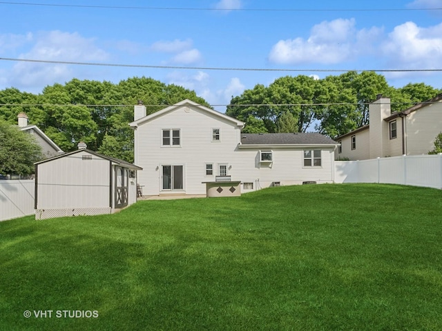 829 Brookside Dr, Bartlett, IL 60103 - back of property featuring a fenced backyard and a chimney