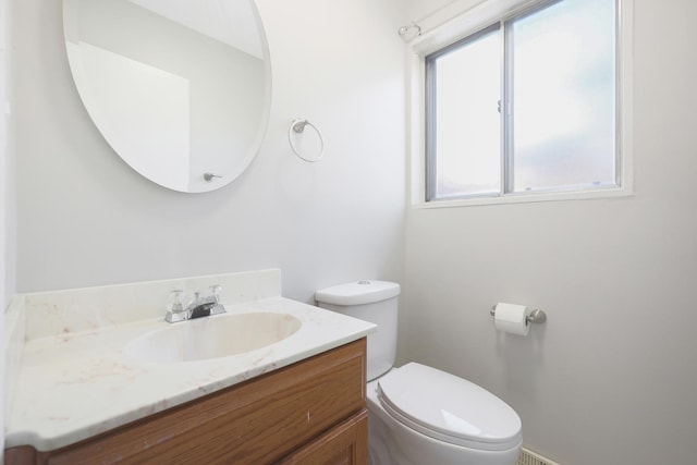 9002 N Clifton Ave, Niles, IL 60714 - bathroom with plenty of natural light, vanity, and toilet
