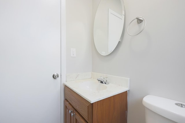 9002 N Clifton Ave, Niles, IL 60714 - half bathroom featuring vanity and toilet