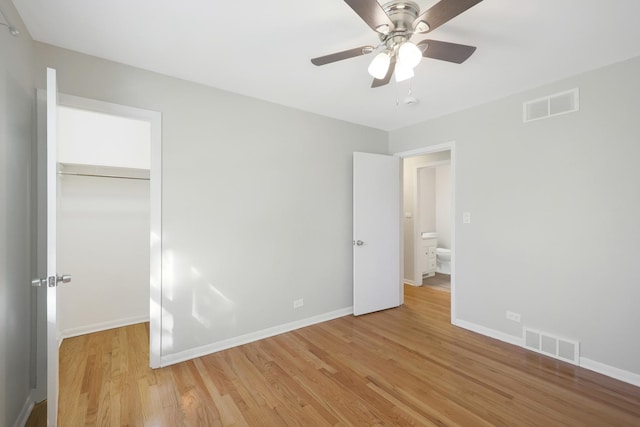 9002 N Clifton Ave, Niles, IL 60714 - unfurnished bedroom with light wood-style flooring, baseboards, a closet, and a ceiling fan