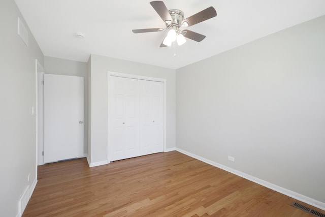 9002 N Clifton Ave, Niles, IL 60714 - unfurnished bedroom featuring light wood-style floors and baseboards