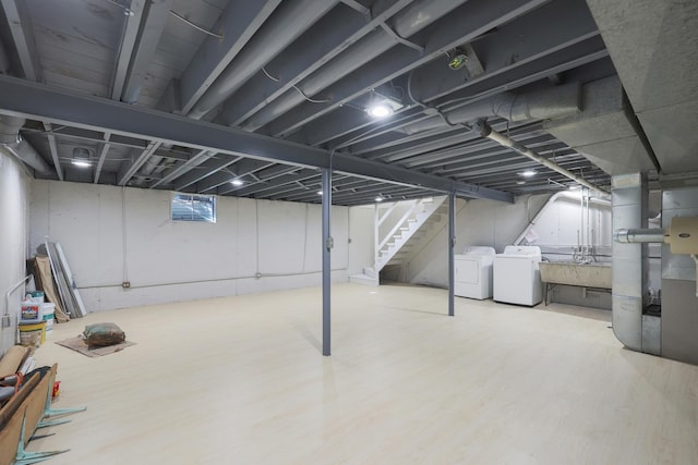 9002 N Clifton Ave, Niles, IL 60714 - basement with washer and clothes dryer, wood finished floors, heating unit, and stairway