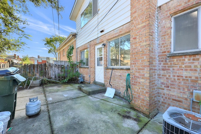 9002 N Clifton Ave, Niles, IL 60714 - view of patio / terrace featuring cooling unit and entry steps