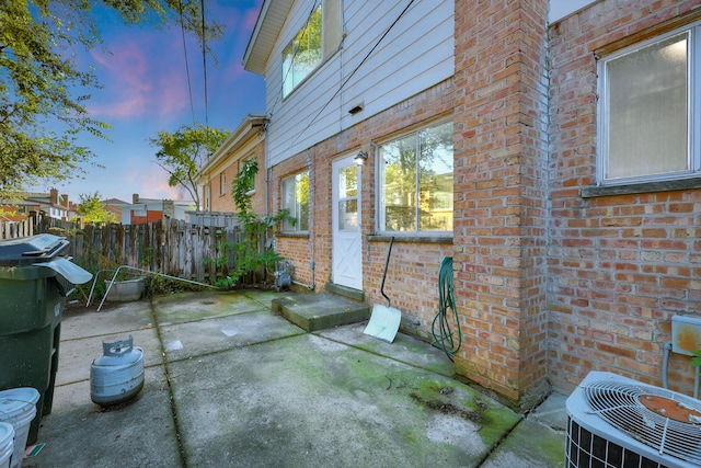 9002 N Clifton Ave, Niles, IL 60714 - view of patio featuring entry steps and central air condition unit