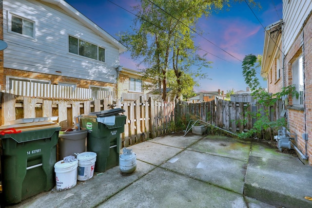 9002 N Clifton Ave, Niles, IL 60714 - patio terrace at dusk with a patio