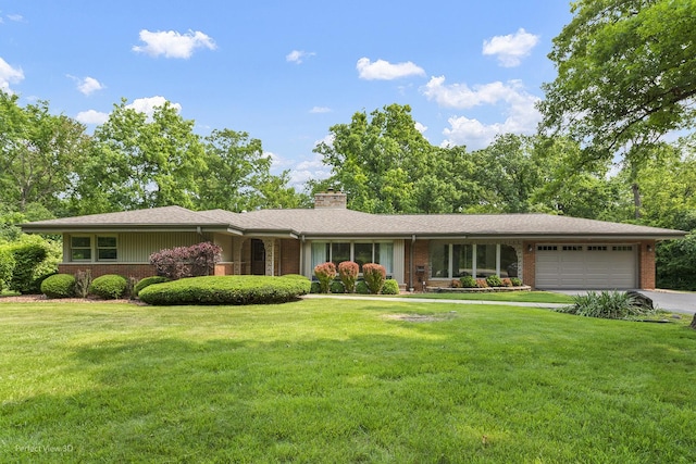 8540 W 119th St, Palos Park, IL 60464 - view of front of home with brick siding, an attached garage, a chimney, and driveway