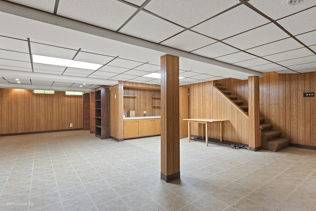 8540 W 119th St, Palos Park, IL 60464 - below grade area featuring a drop ceiling, wood walls, and stairs