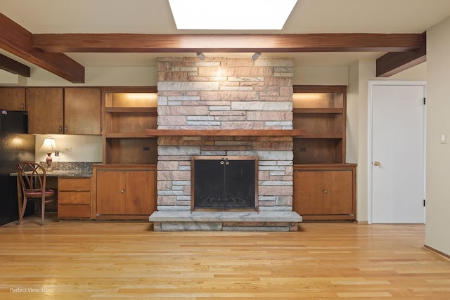 8540 W 119th St, Palos Park, IL 60464 - unfurnished living room featuring beamed ceiling, a fireplace, and light wood-style floors