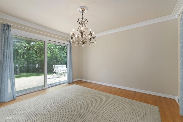 8540 W 119th St, Palos Park, IL 60464 - spare room with a chandelier, crown molding, and wood finished floors
